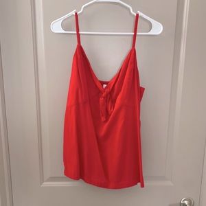 Red sleeveless blouse